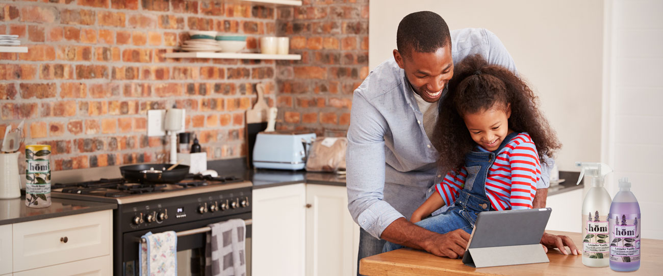 Father and daughter in kitchen